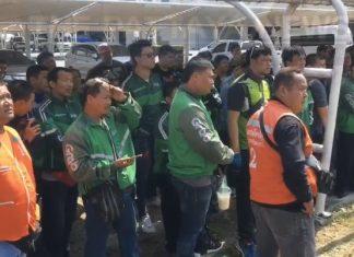 Over 150 Grab motorbike drivers in Pattaya, Thailand strike, demanding better pay and benefits