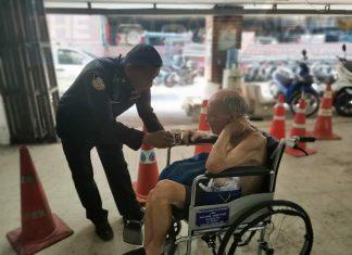 Elderly disabled homeless man getting assistance back to England from Pattaya Law Enforcement