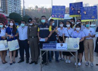 Pattaya City Officials hand out hundreds of free surgical masks to tourists at Bali Hai in response to rising concerns of Chinese Coronavirus