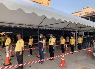 Jomtien Immigration to enforce social distancing while waiting for Immigration support, demonstrate how it should be done