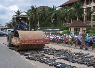 Chonburi police destroy 700 illegal exhaust pipes with a steamroller taken from motorbike racers in Pattaya area