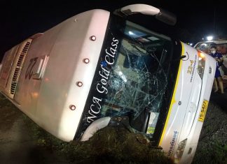 Nineteen passengers were rescued after a tour bus slipped over a roadside due to heavy rain in Udon Thani