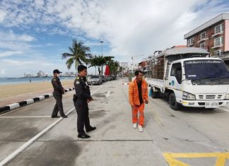 Free parking spaces being painted near Pattaya beach
