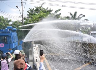 Bangkok Protest Update: Multiple water cannons with chemical laced water fired at pro-democracy protesters attempting to break through barriers near Thailand’s Parliament in Bangkok for protest gathering