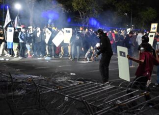 RECAP: Pro-democracy demonstration staged at Democracy Monument in Bangkok yesterday sees high tension and small clashes with riot police throughout the night