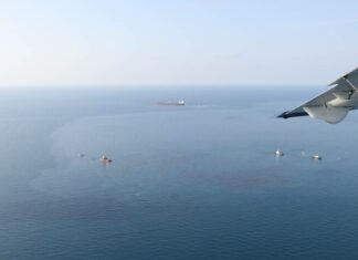 Royal Thai Navy conduct aircraft survey to observe and assist with crude oil spill in Rayong yesterday