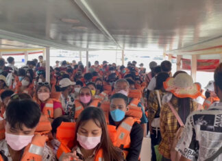 Thai tourists flock to Koh Larn during weekdays seemingly before school opens on May 17th