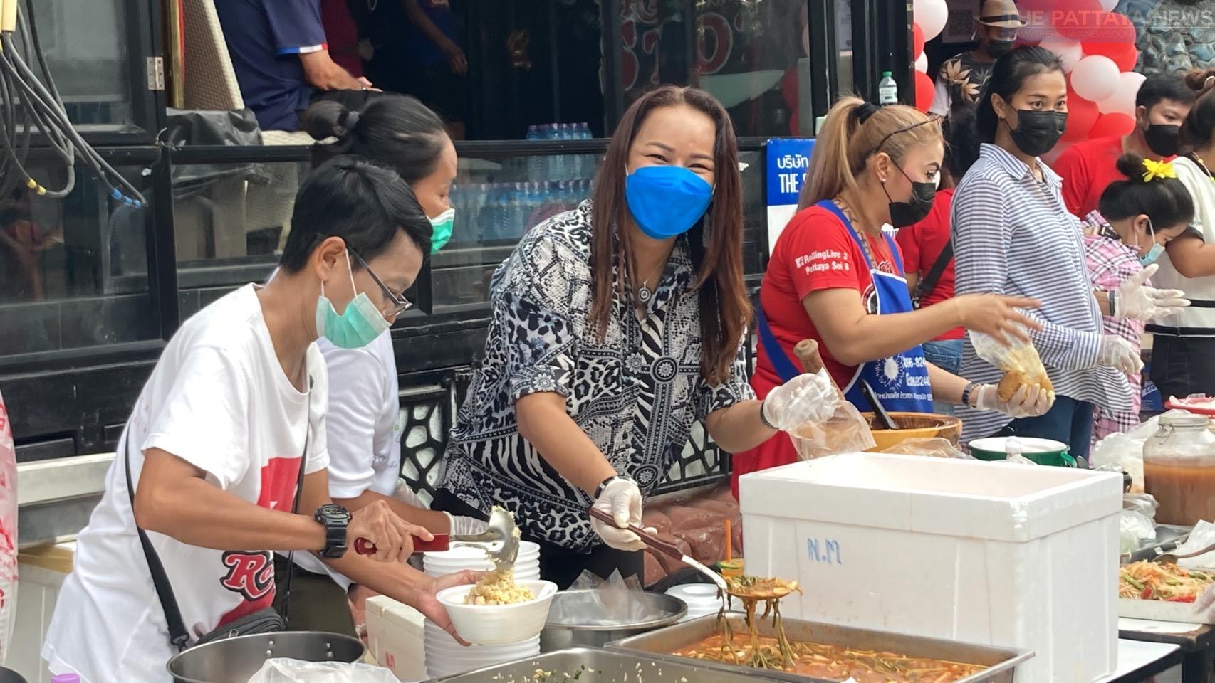 The Stone House’s owner “Amporn” hands out food to the needy to celebrate her 50th birthday on Pattaya Walking Street