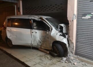 Young woman injured after reportedly crashing her vehicle into commercial building in Pattaya