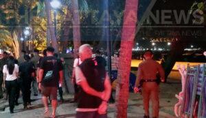 Pattaya police registering and fining suspected transgender prostitutes on Pattaya Beach