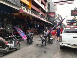 Pattaya Municipal Officials Clean Soi Six Of Illegal Chairs and Signs