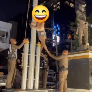 Enraged Transgender Person Climbs Flagpole Outside Pattaya Police Station, Causes Public Scene