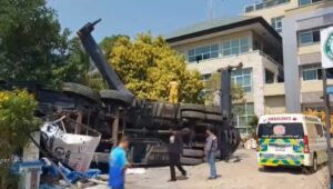 Crane Overturns at Chonburi Construction Site, Injuring Driver