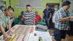 Thai Police Raid Illegal Gambling Den in Saraburi, 36 Individuals Arrested