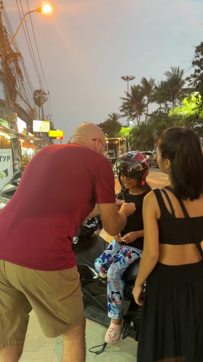 me handing out helmets-19078403818245459582.