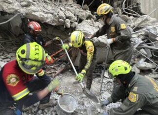 Crowds, YouTubers, and TikTokers Join Media in Overnight Vigil at Collapsed Bangkok Building