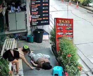 CCTV Captures Thief Stealing Phone from Intoxicated Massage Worker Asleep Outside Pattaya Shop