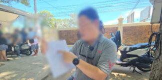 Markägare i Pattaya förnekar äganderätt till den razzierade e-cigarettfabriken, säger att familjen är förkrossad av polisens tillkännagivande.