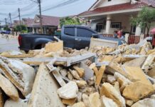 Foam Waste from Illegal Dump Floods Thai Village in Sri Racha After Wall Collapses in Heavy Rain