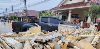 Foam Waste from Illegal Dump Floods Thai Village in Sri Racha After Wall Collapses in Heavy Rain
