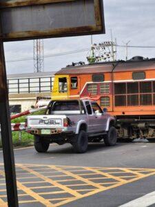 Reckless Foreign Driver in Pickup Truck Nearly Collides with Oil Train at Pattaya Railway Crossing