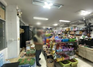 Sri Racha Officials Probe Allegedly Unlicensed Myanmar-Run Businesses in Condo Area