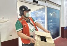 Pattaya Police Confused After Motorcycle Taxi Driver Brings Bat to Police Station Seeking Help