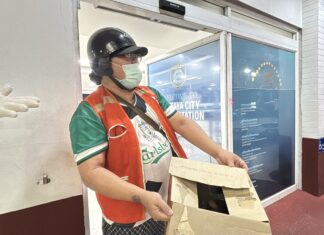 Pattaya Police Confused After Motorcycle Taxi Driver Brings Bat to Police Station Seeking Help