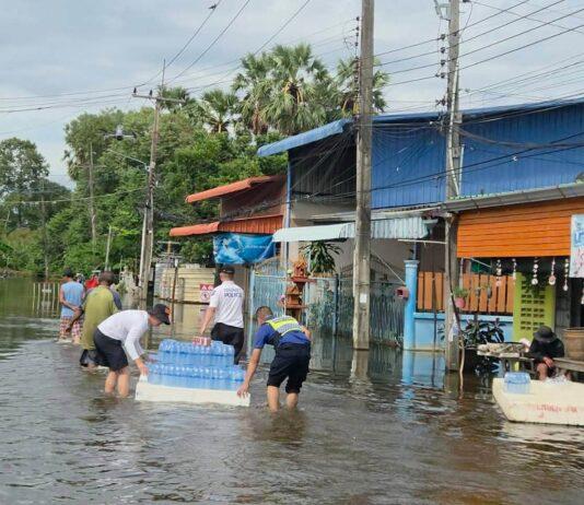 Pattaya Tourist Police Take Food, Water, and Drones into Flooded Bang Khla to Help Flood Victims